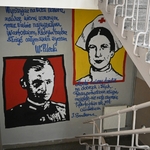 Mural na ścianie półpiętra