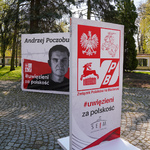 Wystawa poświęcona ofiarom represji na Białorusi. Na jednej z plansz wizerunek Andrzeja Poczobuta