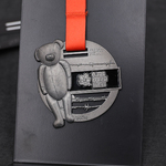 Medal z odlewem misia.
