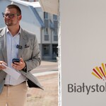 Zastępca prezydenta Tomasz Klim stoi przy urzędomacie trzymając w rękach odebrany dokument